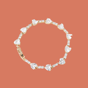 A dainty 18K gold plated bracelet with zirconia accents.