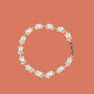 Gold bracelet with clear stones