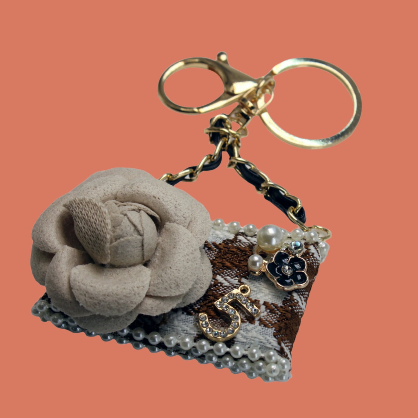 Designer keychain with floral detail