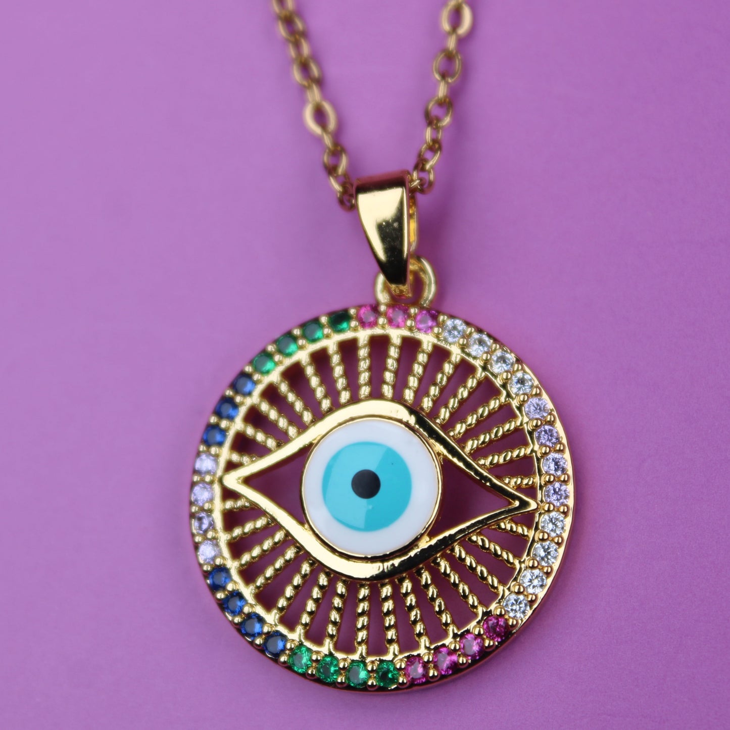 Necklace with an eye-shaped pendant on a purple background