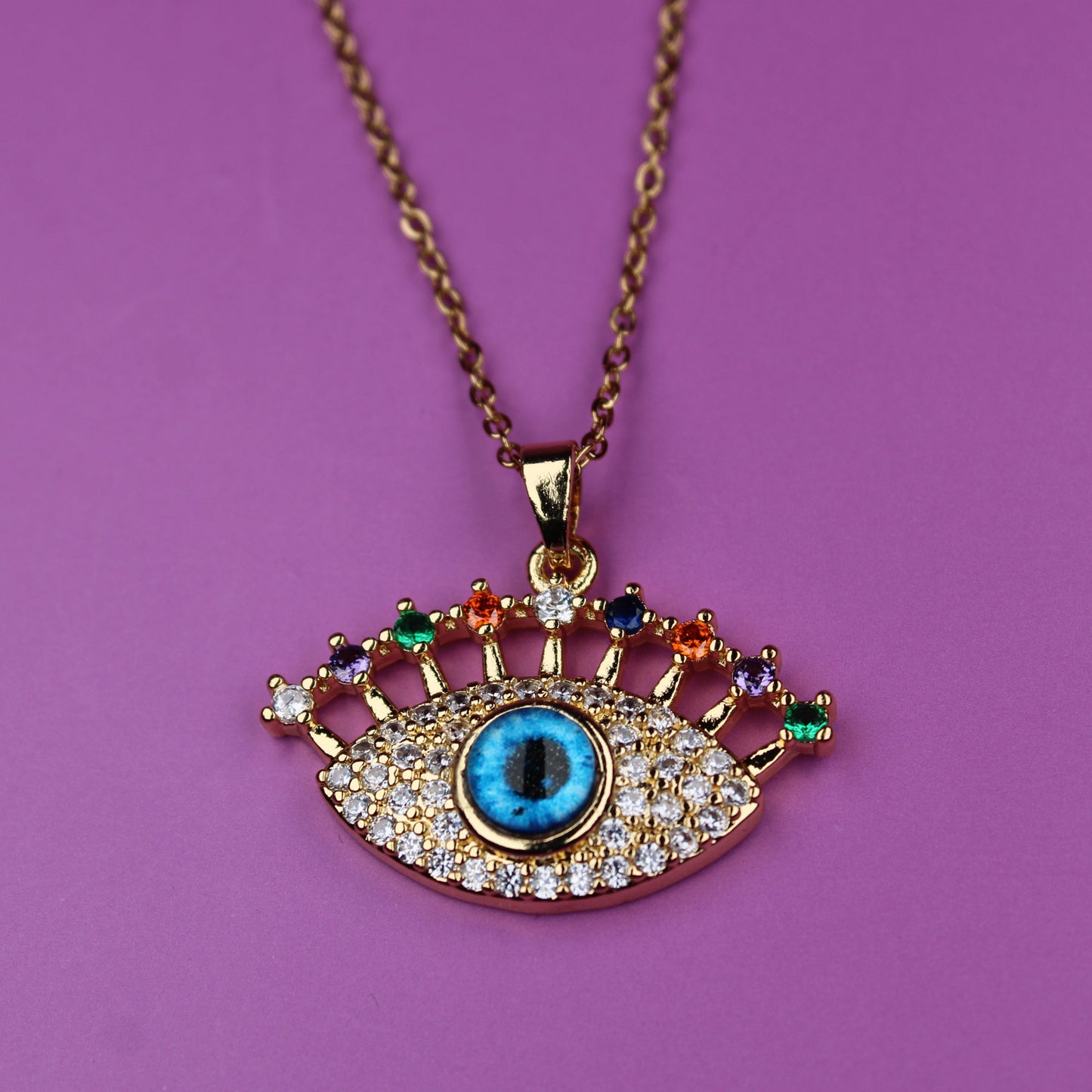 Necklace with an eye-shaped pendant on a purple background