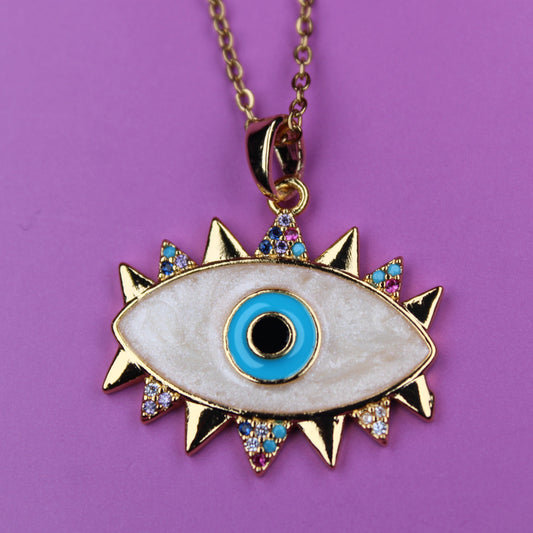 Necklace with an eye-shaped pendant on a purple background