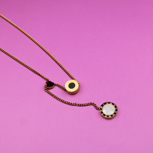 Necklace with pendant on a pink background