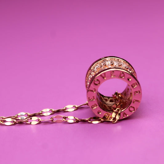 Rose gold hairpin on a pink background