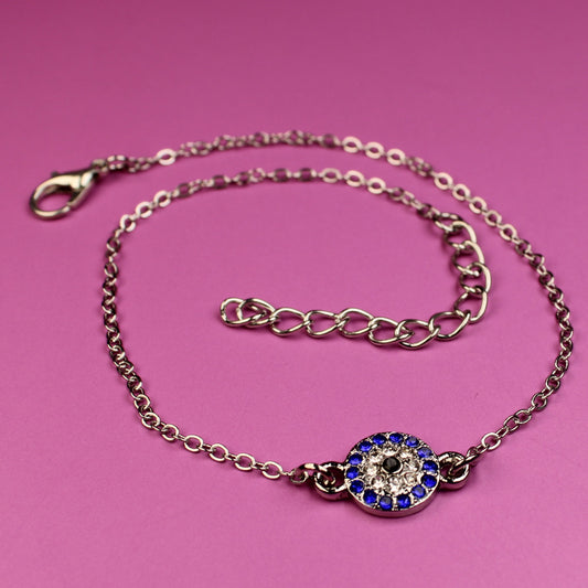 Bracelet with a decorative clasp on a pink background