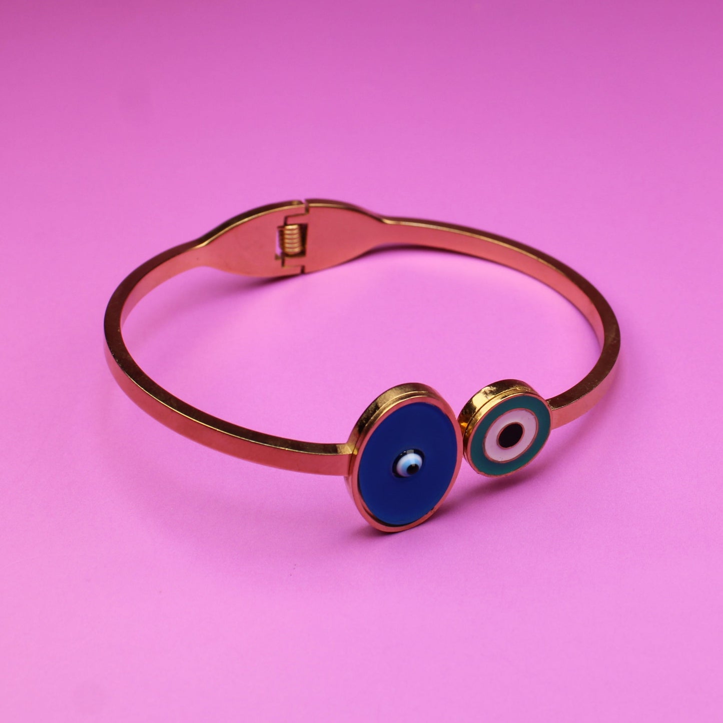 Bracelet with eye design on a pink background