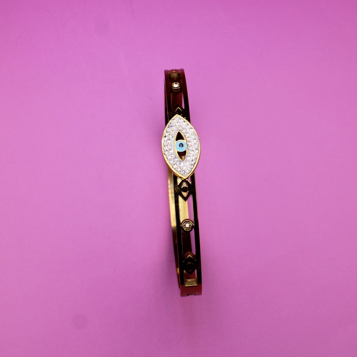 Wristwatch on a pink background