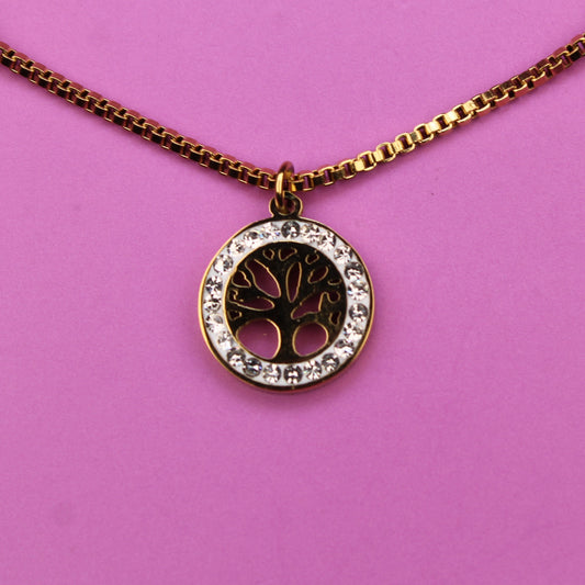 Necklace with a circular pendant on a pink background