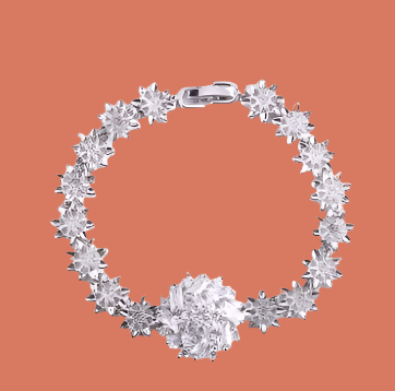 Silver bracelet with floral design.