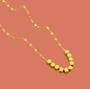 Gold necklace with hexagonal beads
