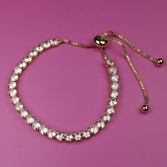 Bracelet with clear stones on a pink background