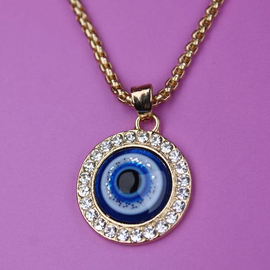 Necklace with a blue eye pendant on a purple background