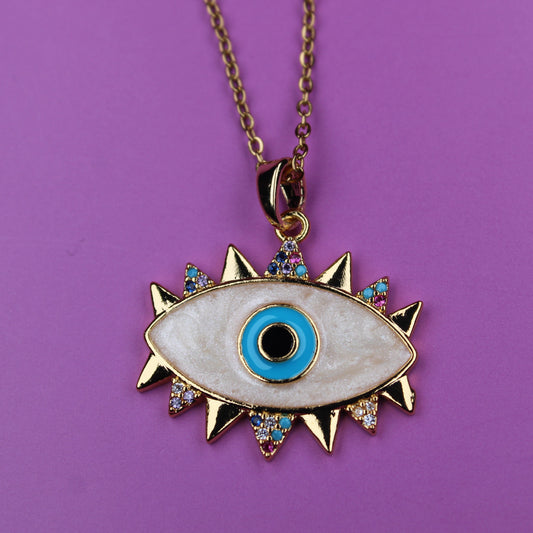 Necklace with an eye-shaped pendant on a purple background