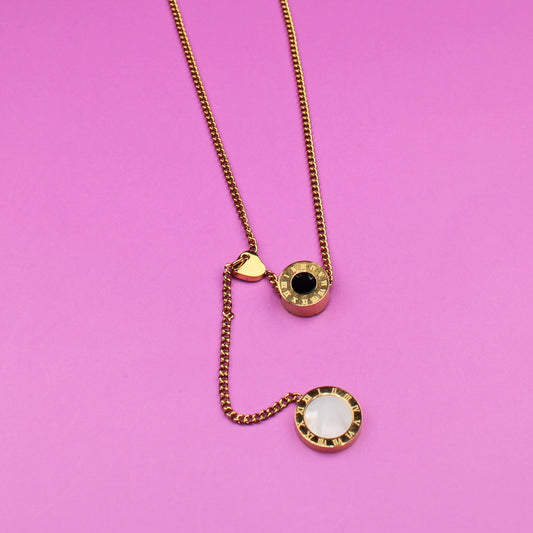 Necklace with pendant on a pink background