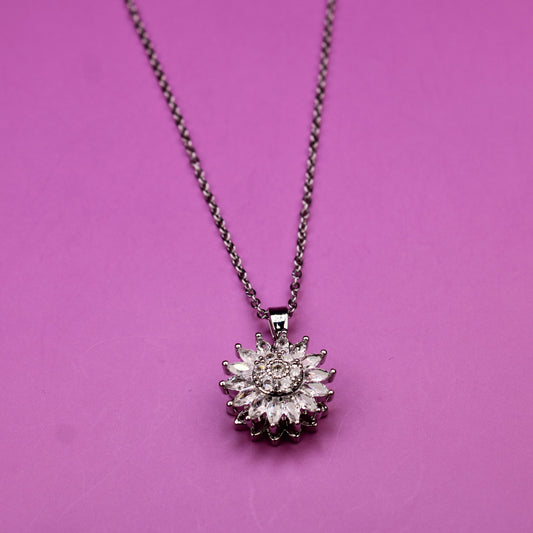 Diamond necklace on a pink background