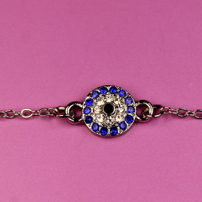 Bracelet with a decorative clasp on a pink background