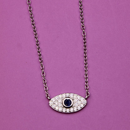 Necklace with an eye-shaped pendant on a purple background