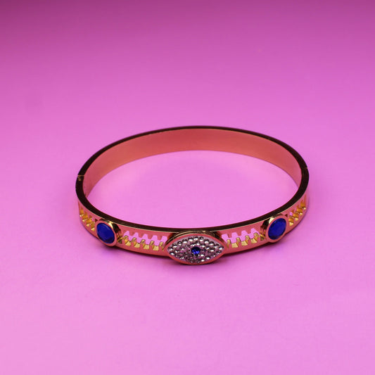Bracelet with decorative elements on a pink background