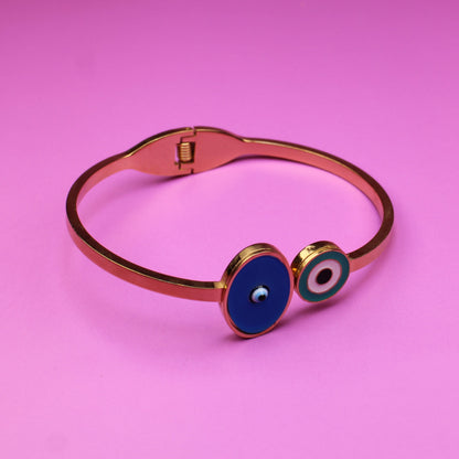 Bracelet with eye design on a pink background