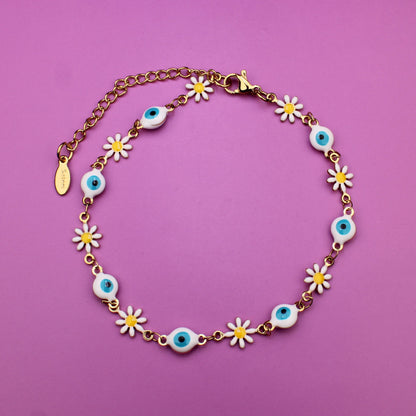 Necklace with floral designs on a pink background