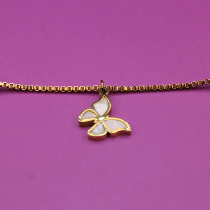 Bracelet with a butterfly charm on a purple background