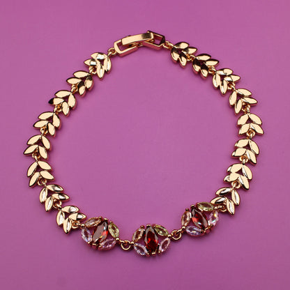 Gold bracelet on a purple background